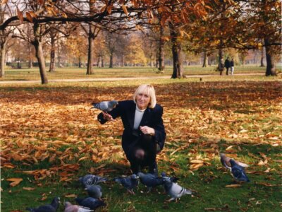 Ingrid Newkirk IEN in park with birds
